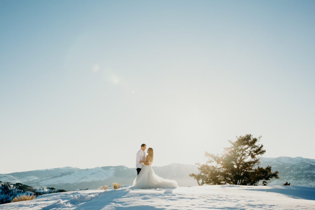 Wedding portraits during sunset at Amangani Resort in Jackson Hole Wyoming during late winter